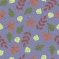 Seamless pattern . maple leaves, birch leaves, oak leaves and rowan leaves on a purple background Royalty Free Stock Photo