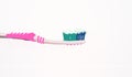 Painted pink toothbrush with toothpaste Royalty Free Stock Photo