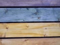 Painted planks, horizontal pattern closeup multi colored background