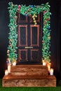 Painted red door and christmas decorations. Traditional American red front door. Chalk board Royalty Free Stock Photo