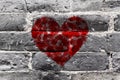 Painted Red Heart Shape on Black Brick Wall Royalty Free Stock Photo