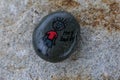 Painted rock with picture of a stick figure and words stating `Hey buddy`