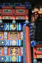 Painted and sculpted patterns decorate a gate (China)