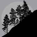 Painted silhouette of trees on a mountainside in a gray sky