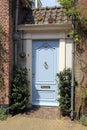 Painted sky blue door on Dutch house in Wassenaar, Holland Royalty Free Stock Photo