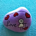 Painted stone with message of Love Royalty Free Stock Photo