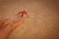 Painted toe nails beach Royalty Free Stock Photo