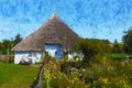Painted traditional reed roof covered house with cottage garden on island Ruegen Royalty Free Stock Photo