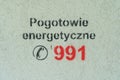 Painted on the wall is 991 emergency number in Poland. Royalty Free Stock Photo