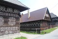 Painted wooden log houses in Cicmany, Slovakia Royalty Free Stock Photo