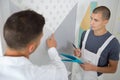 Painter with apprentice Royalty Free Stock Photo