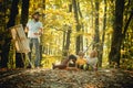 Painter artist with family relaxing in forest. Painting in nature. Start new picture. Capture moment. Beauty of nature Royalty Free Stock Photo