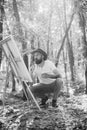 Painter artist forest. Art concept. Painting in nature. Start new picture. Painter with easel and canvas. Bearded man Royalty Free Stock Photo