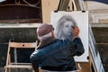 A Painter on the Charles Bridge at prague