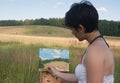 Painter-girl en plein air Royalty Free Stock Photo