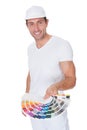 Painter Holding A Paint Roller And Spectrum Royalty Free Stock Photo