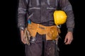 Painter holding a wall brush in his hand. Accessories for small home repairs