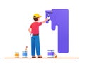 Painter man painting house wall with roller brush Royalty Free Stock Photo
