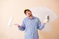 The painter man painting the wall at home Royalty Free Stock Photo