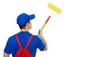 Painter man in uniform with paint roller Royalty Free Stock Photo