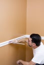 Painter painting trim around doors & windows Royalty Free Stock Photo