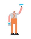 Painter paints. Painter with bucket of paint and roller paints the wall Royalty Free Stock Photo