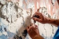 Painter preparing a wall for painting, featuring activities such as sanding, filling cracks, and applying primer, highlighting the