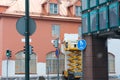 Painter with roller painting house facade in town Royalty Free Stock Photo