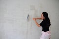Painter On Stepladder Painting Wall With Brush Royalty Free Stock Photo