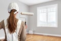 Painter woman with painting roller Royalty Free Stock Photo