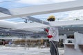 The painter is working to fireproof paint on steel structure with spray gun, at industrial factory