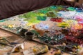 Painter's palette with oil paints Royalty Free Stock Photo