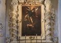 Painting of Archangel Michael defeating evil above one of the altars, Basilica di Santa Croce Royalty Free Stock Photo