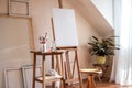 Painting art studio at loft apartment. Empty cozy workplace Royalty Free Stock Photo