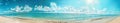 A Painting of a Beach With Blue Water and Clouds Royalty Free Stock Photo