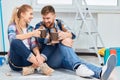 Painting couple on break drinking coffee Royalty Free Stock Photo