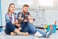 Painting couple on break drinking coffee Royalty Free Stock Photo