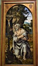 Painting depicting an elderly hermit praying at the foot of a small crucifix attached to a shrub, at the Uffizi museum in Florence