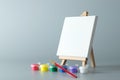 Painting easel with empty canvas Royalty Free Stock Photo