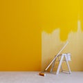 Painting empty room wall in yellow.Concept for home renovation