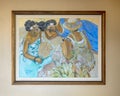 Painting featuring Hawaiian women relaxing on a beach by by McGovney Hansen in 1996 on the wall of a Hawaiian resort.