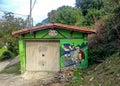 Painting on garage with pilgrims