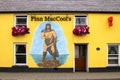 Artwork of giant on pub wall