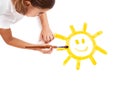 Painting a happy sun Royalty Free Stock Photo