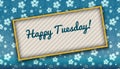 Painting with HAPPY TUESDAY message on blue wallpaper with flo