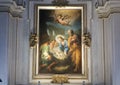 Painting of Mary and the Baby Jesus above an altar inside the Basilica Saint Maria in Trastevere