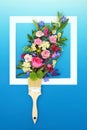 Painting with Paintbrush Summer Flowers Surreal Concept Royalty Free Stock Photo