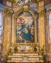 Painting `The Penitent Magdalen Adoring the Cross` by Michele Rocca, in the altar of the Church of Santa Maria Maddalena in Rome.