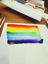 Painting a rainbow with aquarel watercolor