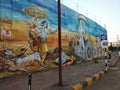 Painting on road side big wall in Indore City india